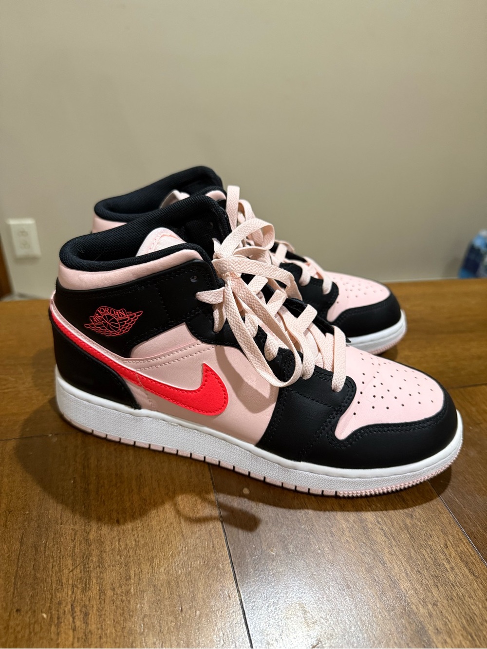 Nike Air Jordan Pink and Black High-Top Sneakers with Red Swoosh